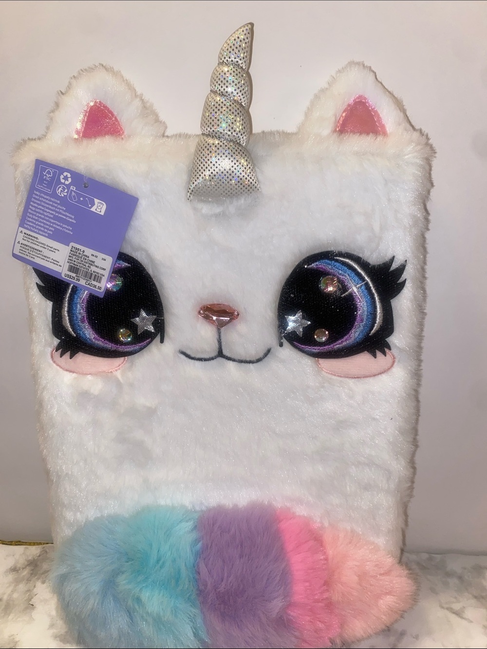 Claire's White Plush Unicorn Notebook with Rainbow Pastel Accents